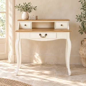 Bureau secrétaire Louis XV ivoire et bois dans une pièce beige