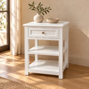 Table de nuit Starck blanche satinée dans une chambre beige